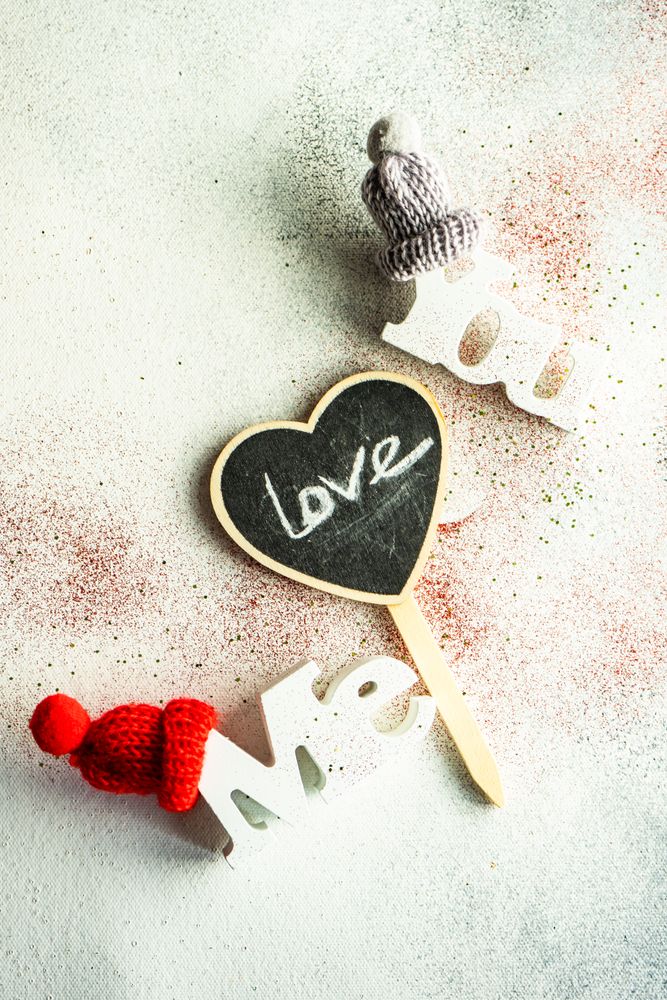 Valentine's day concept of "Me" & "You" blocks with woolen hats