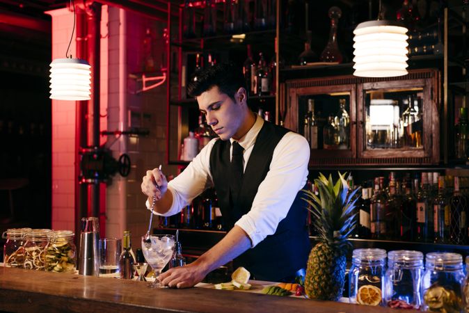 Barman working making drinks
