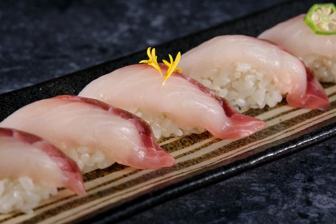 Plate with delicious nigiri sushi on plate