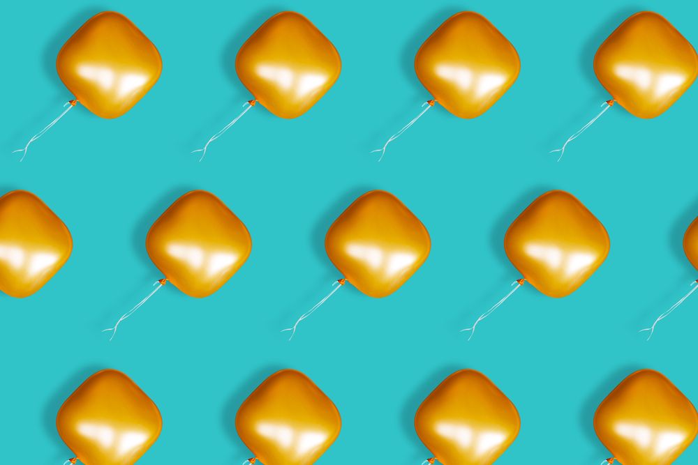 Rows of orange square balloons