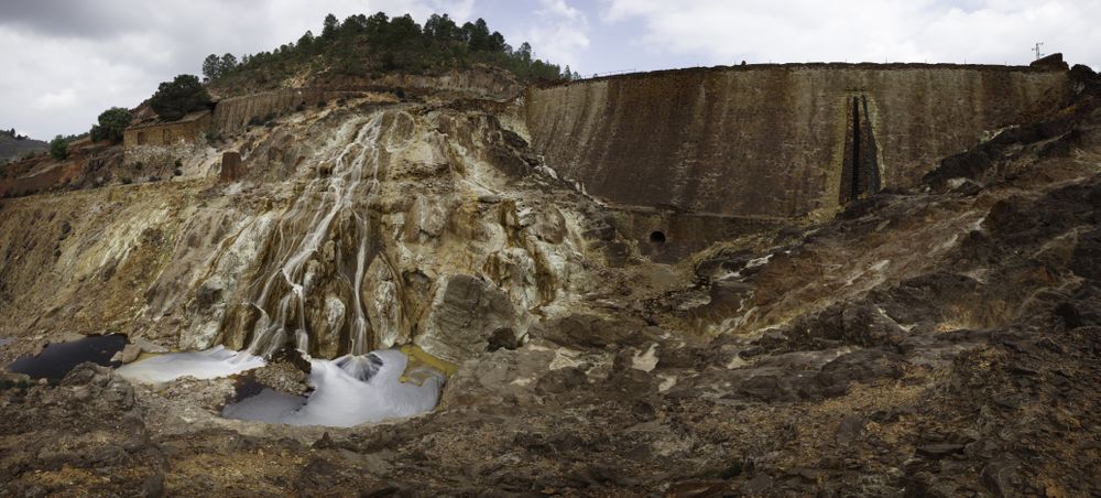 Stream flowing on sandy rock