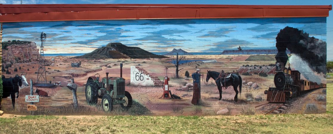 Route 66 Mural with western scenes, in Tucumcari, New Mexico