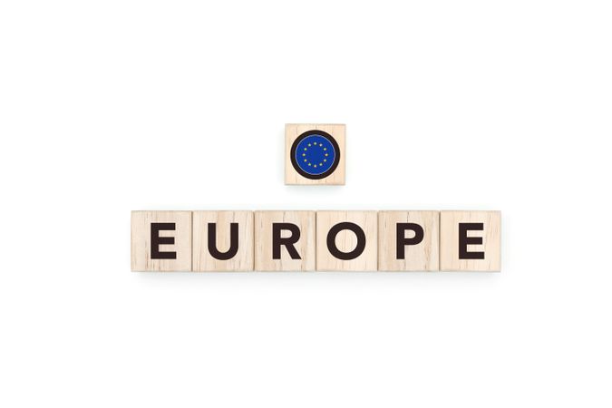 Wooden blocks bearing the name and flag of Europe.