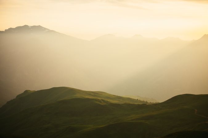Majestic mountains range in clouds