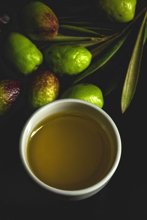 Fresh Spanish extra virgin olive oil with olives