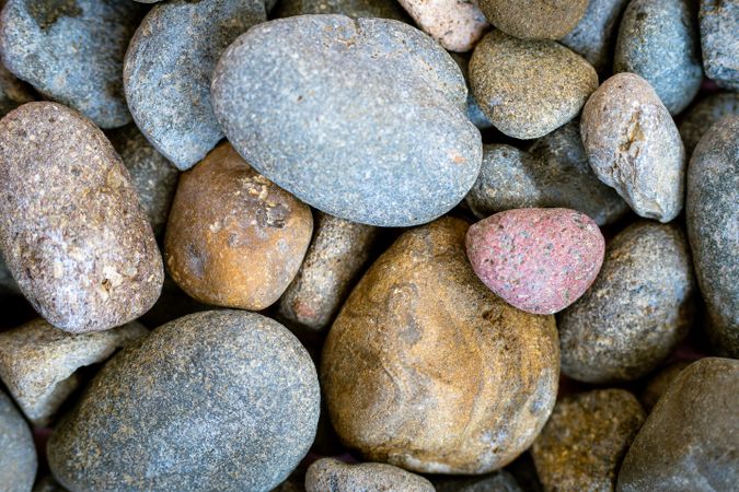 A pile of rocks with a variety of colors and sizes