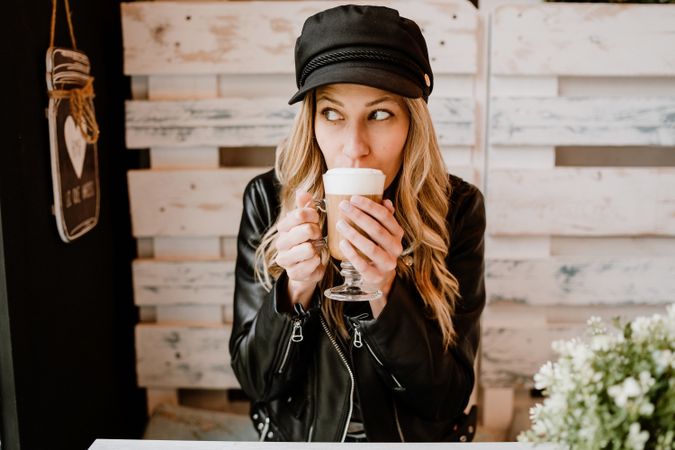 Woman holding coffee in hands