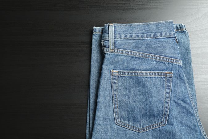 Classic jeans on background, space for text