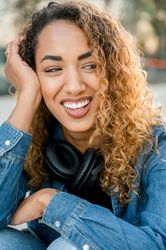 Smiling woman with curly hair