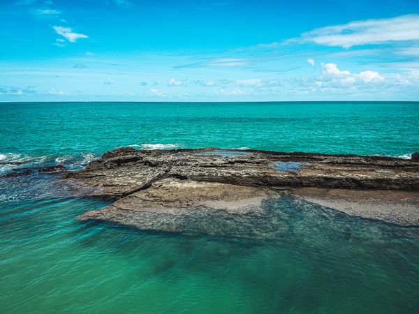 Rocks in clear waters at beach in Brazil