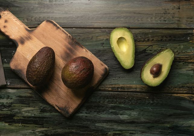 Set of freshly cut fresh avocados