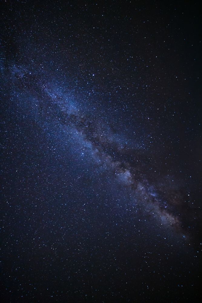 milky way galaxy and space dust in the universe, Long exposure photograph, with grain.