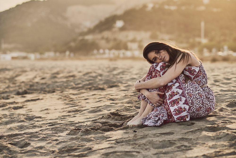 Woman with dress at the beach