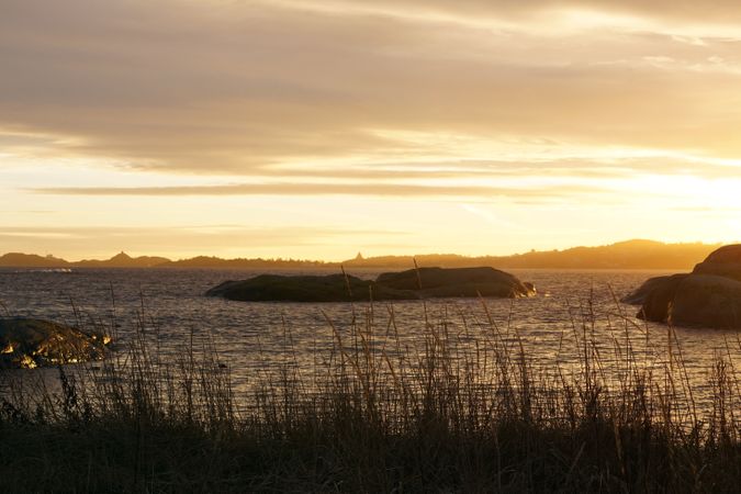 Peaceful seashore lake at sunset