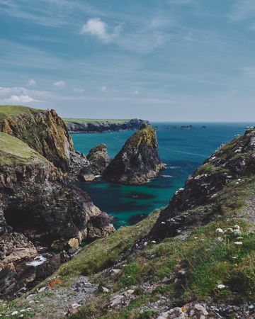 Beautiful view of a rocky cove from a rocky cliff on the British Coast