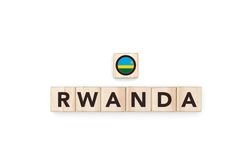 Wooden blocks bearing the name and flag of Rwanda.