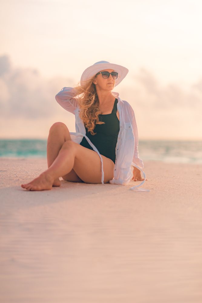 Woman sitting on beach
