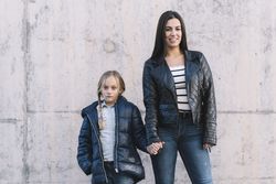 Young sisters holding hands