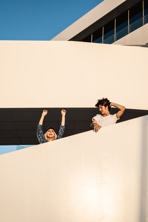 Happy couple on modern building