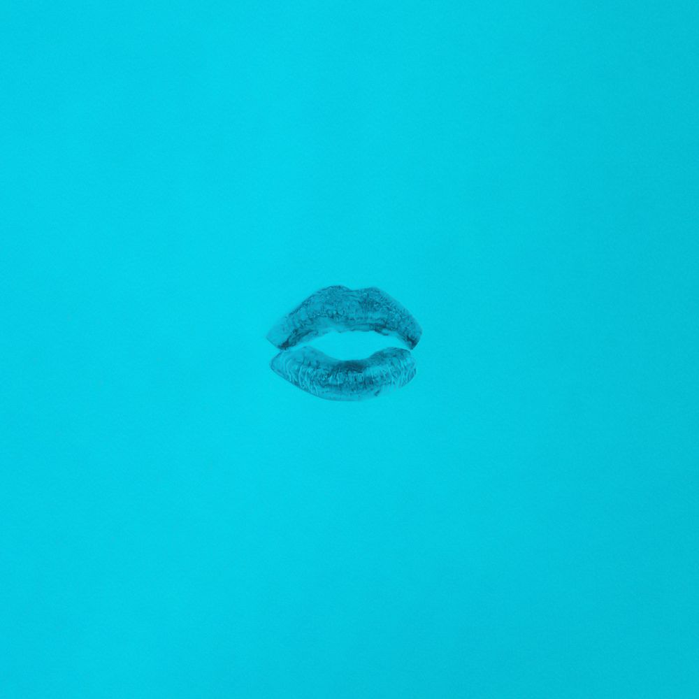 Lipstick mark on blue background