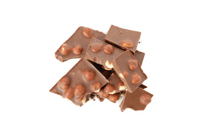 Tasty chocolate pieces isolated on blank background