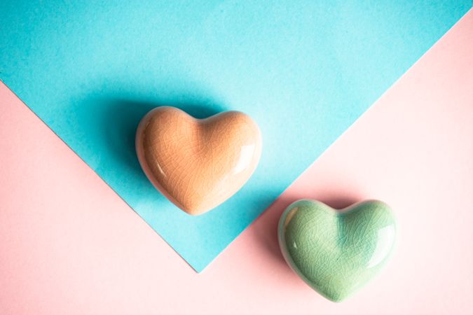 Heart ornaments on pastel pink table