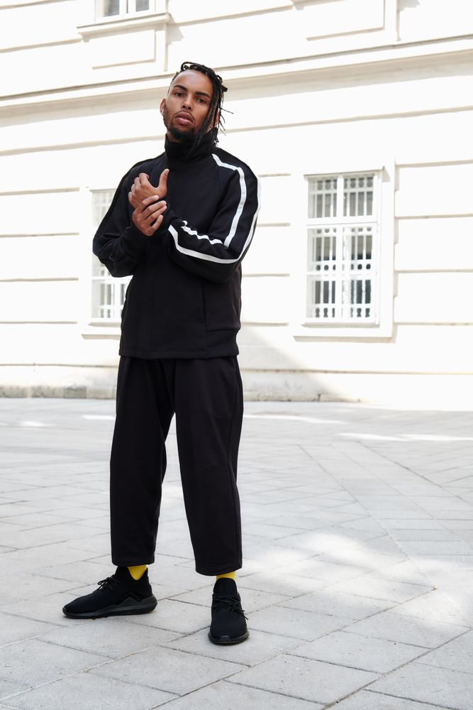 Black male standing on the street