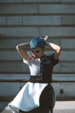 Expressive model in alternative dress on street