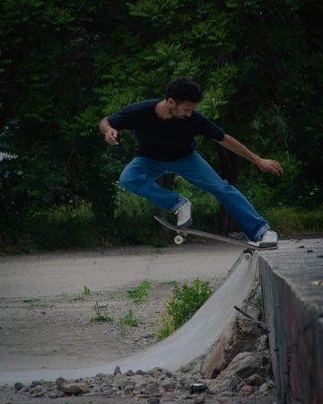 Young man skateboarding outdoor during daytime