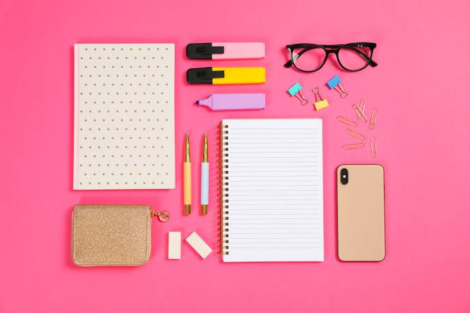 Flat lay composition with stationery on pink background, space for text