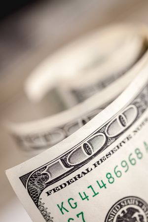 Abstract of One Hundred Dollar Bills with Narrow Depth of Field.