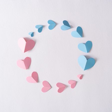 Creative layout with pink and blue paper hearts
