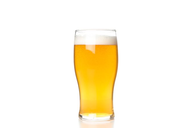 Glass of beer isolated on plain background