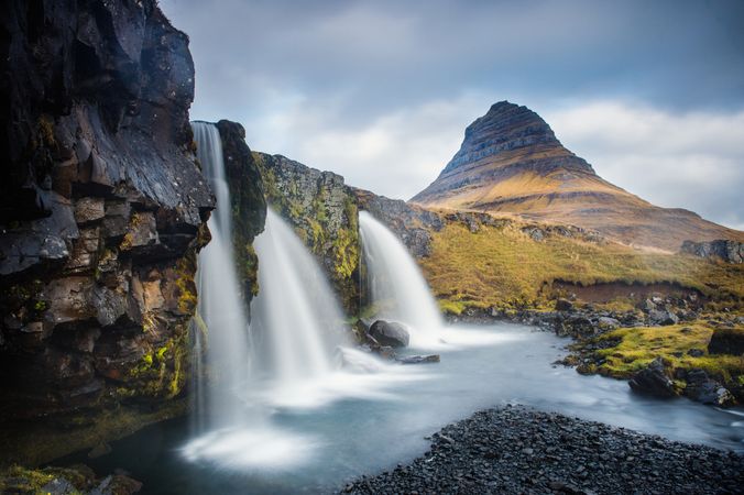 Waterfall between lands of valley