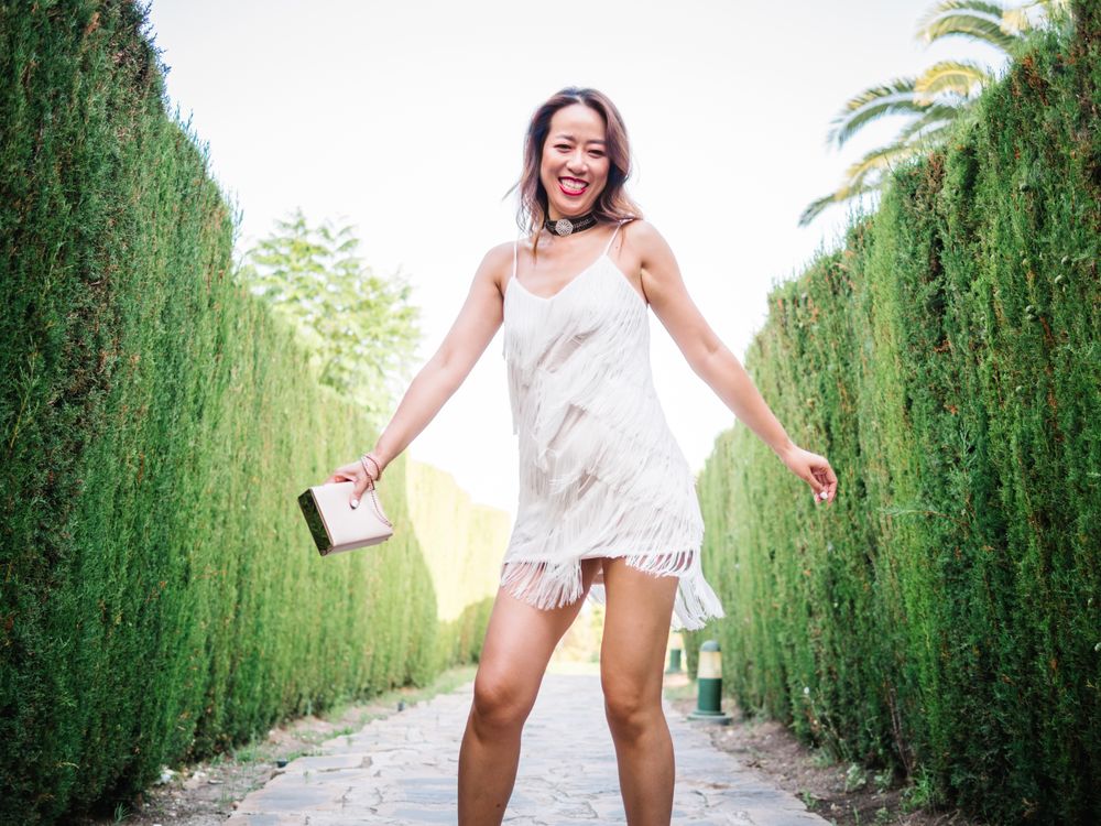 Young elegant Asian woman at a luxurious resort