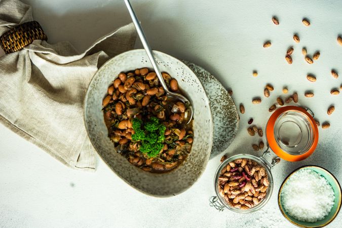 Top view of traditional Georgian bean dish - lobio, served in modern textured ceramic bowl