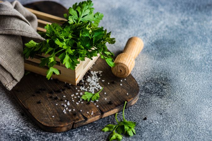 Parsley and salt on board