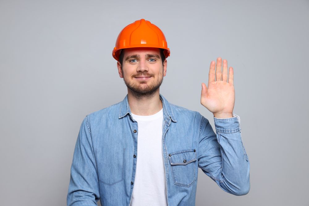 Young man civil engineer in safety hat