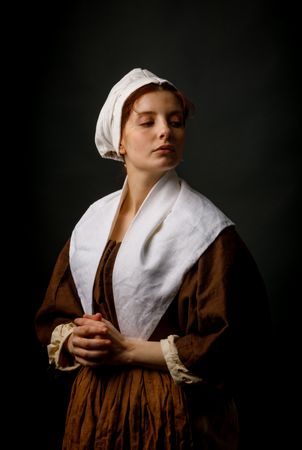 Medieval maid posing in studio