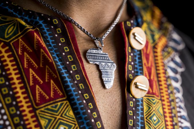 Silver pendant depicting Africa on neck