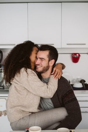 Multiethnic couple in modern kitchen