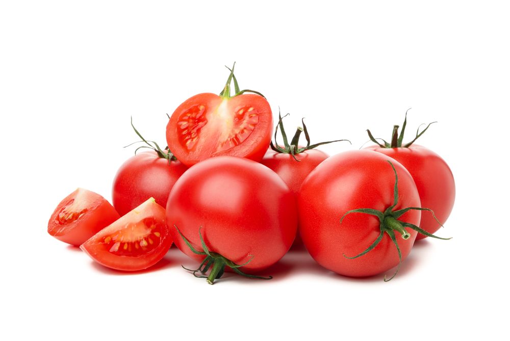 Fresh ripe tomatoes isolated on plain background
