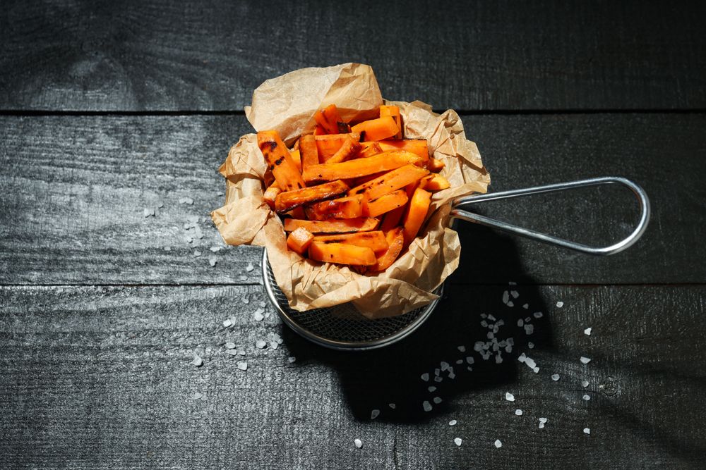 Concept of tasty food, fried sweet potato