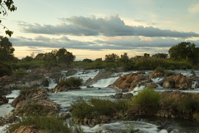 River landscape at sunset of the famous Li Phi or Tat Somphamit waterfalls, on the Mekong River