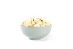 Bowl with popcorn isolated on blank background