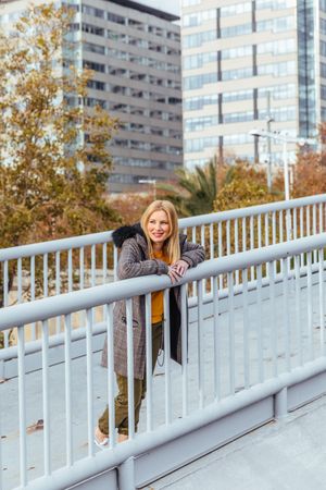 Blonde woman posing in the city