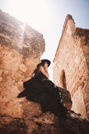 female in ruins of old castle
