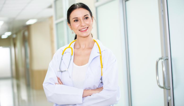Portrait of happy female doctor with stethoscope