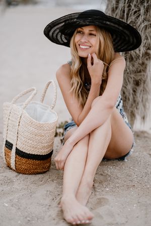 Young female relaxing on beach