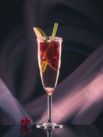 Glass with drink and berries